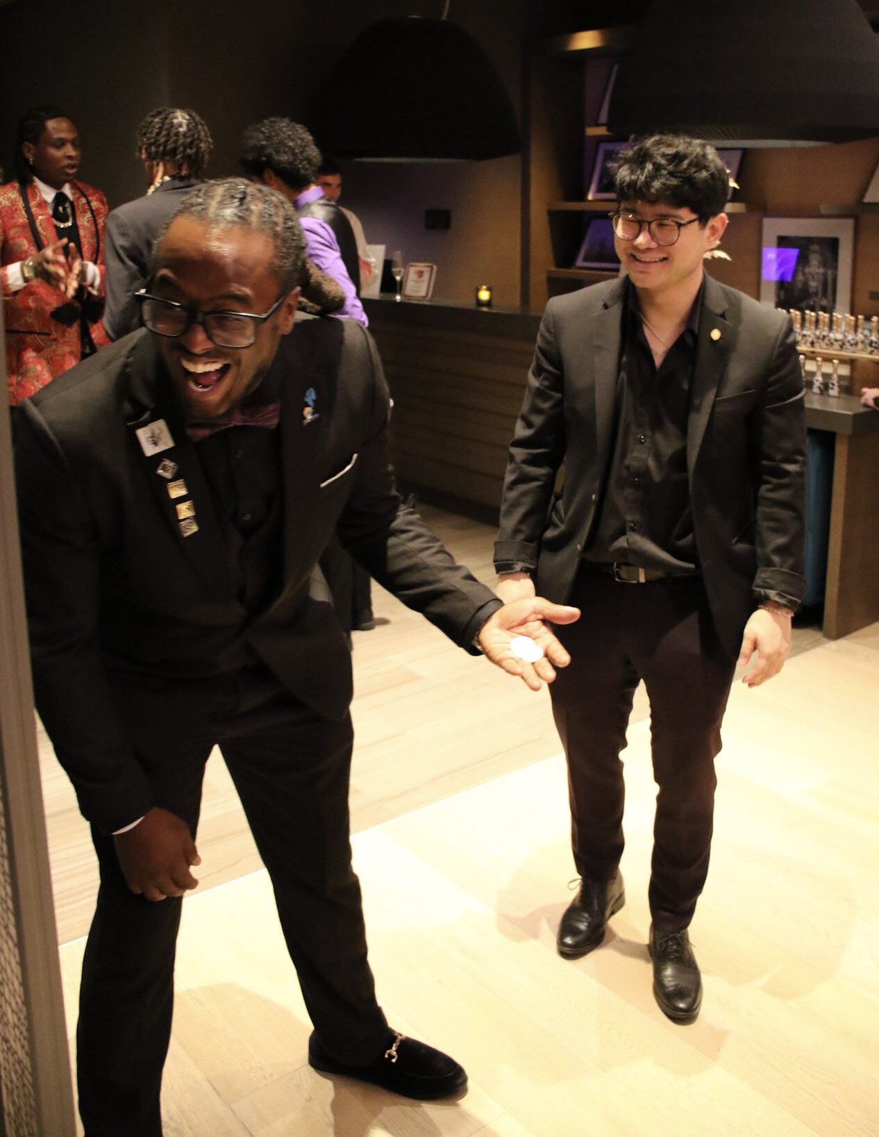 Corporate Party person reacts strongly and loves magic